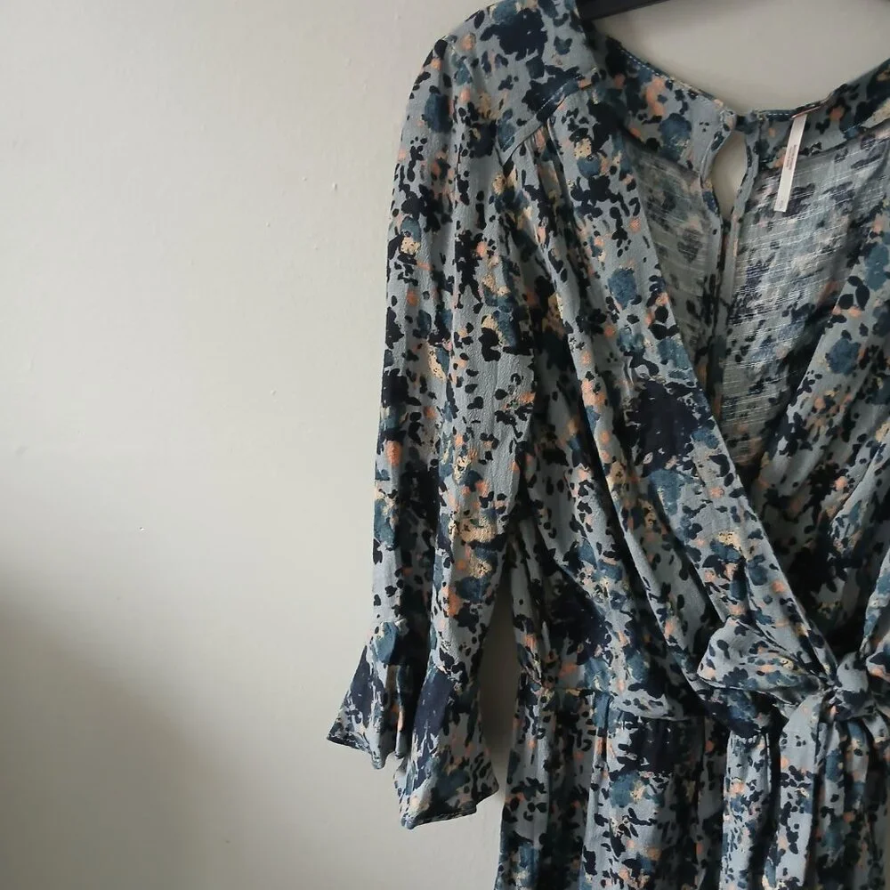 Free People Size S All the Right Ruffles Blue Floral Romper Flutter Sleeve Vneck